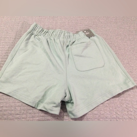 New Balance Sport Essentials French Terry Shorts 5 Inch Inseam Men’s Salt Marsh - Picture 2 of 7